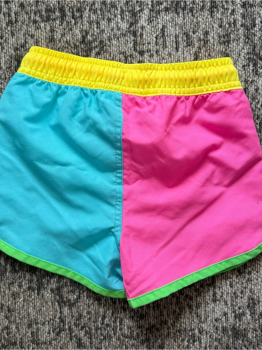 RuggedButts Neon Color Block Swim Trunks Boys Dolphin Hem UPF 50 Board Shorts